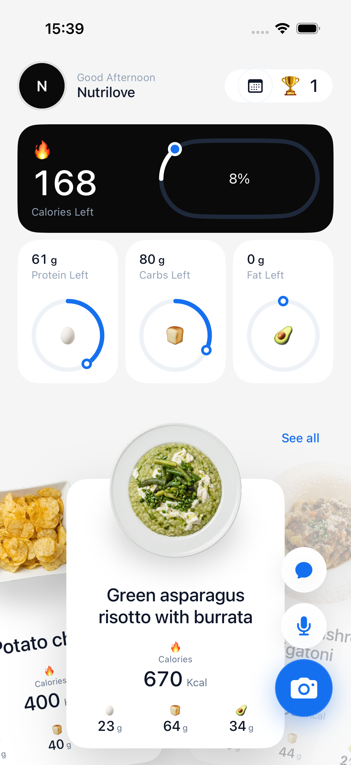 Boocheck home dashboard with calorie and macro rings and a meal carousel
